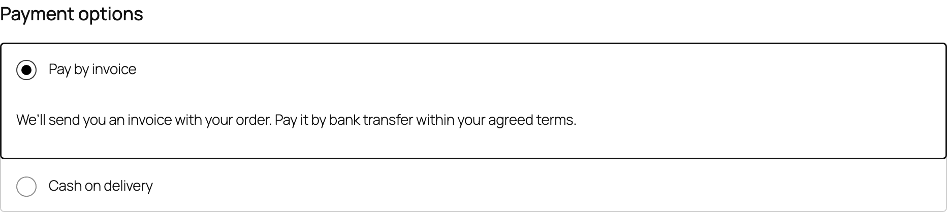 Payment options at checkout with Pay by invoice selected and its description.